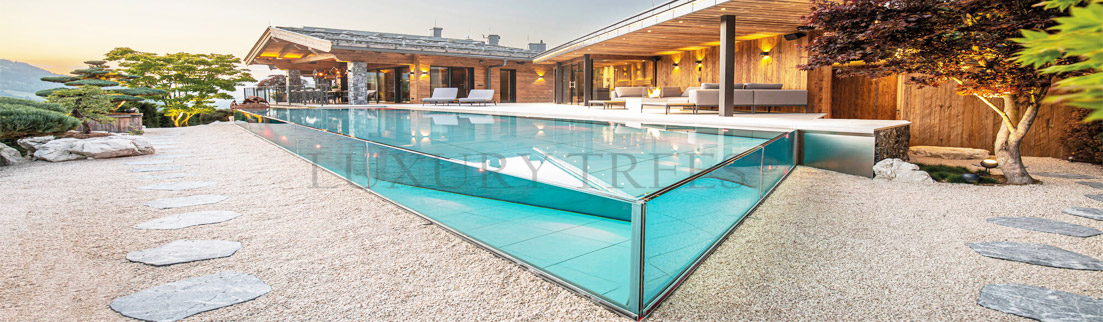 Gartenneugestaltung-Garten-Gestalten-lassen-traumgarten-1exklusiver-swimmingpool-luxus-swimmingpool-3